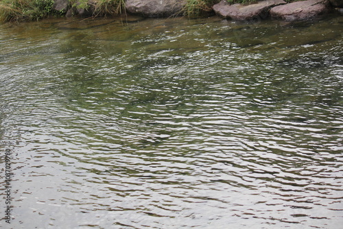 Beautiful image of flowing waves of clear water of Daecheongcheon Stream