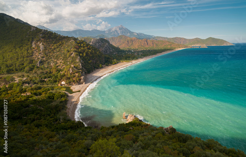 Fototapeta Naklejka Na Ścianę i Meble -  Panoramic view of Cirali Olympos Beach. Turkey's Mediterranean coastal landscape in the fall season. Kumluca, Antalya province, Turkey 

