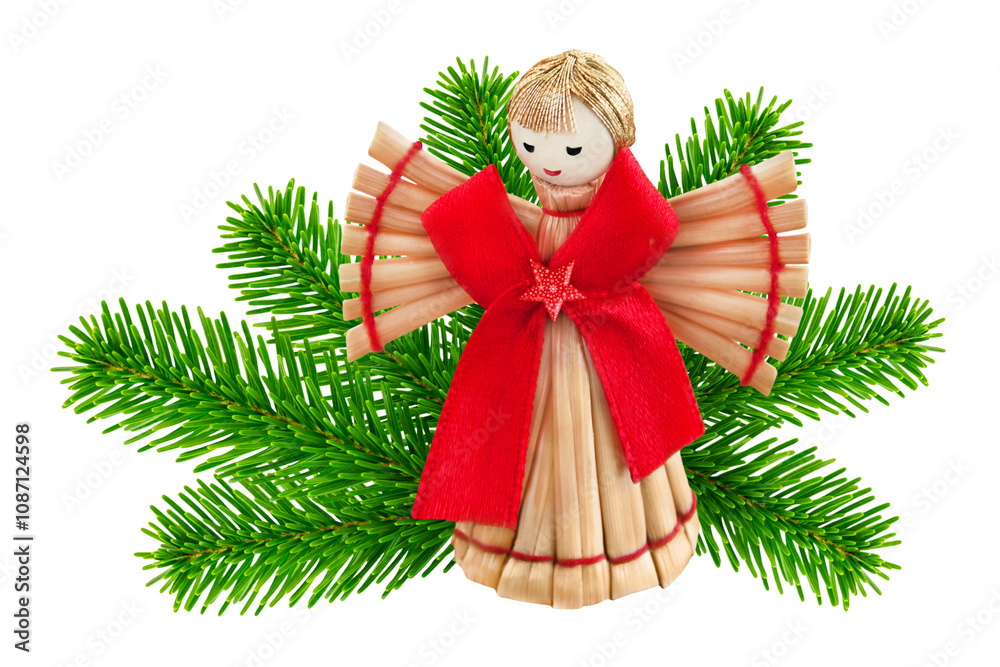 Naklejka premium Christmas Straw Angel and fir branches isolated on white background