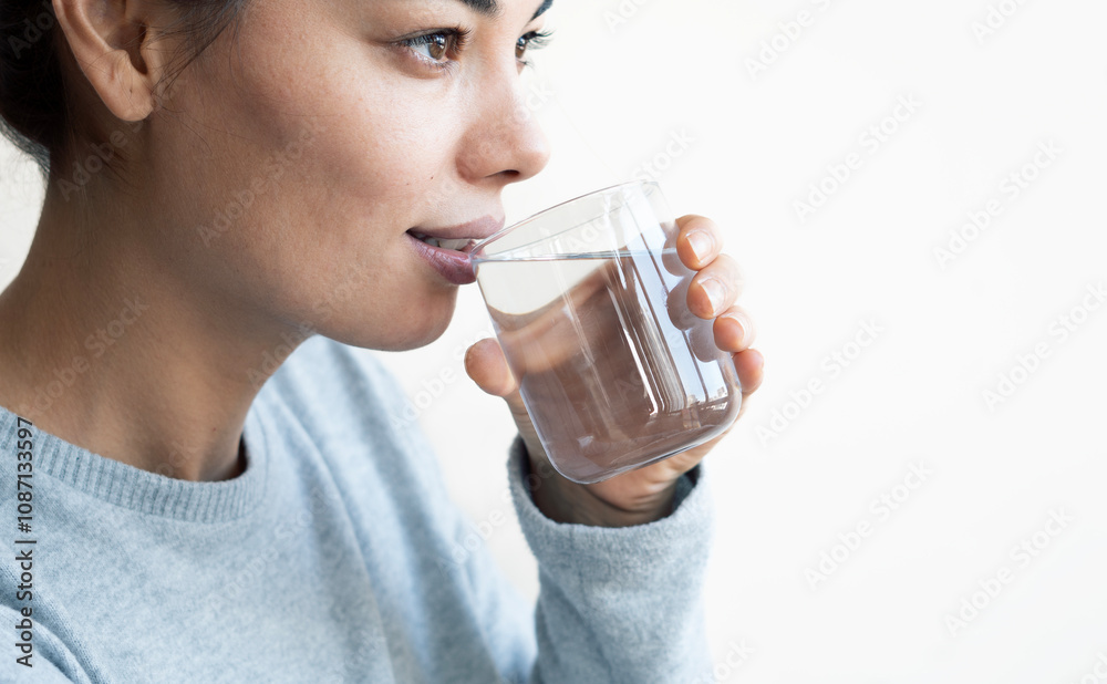 Water concept, Woman Drinking Water on white background Water concept, Woman Drinking Water on white background