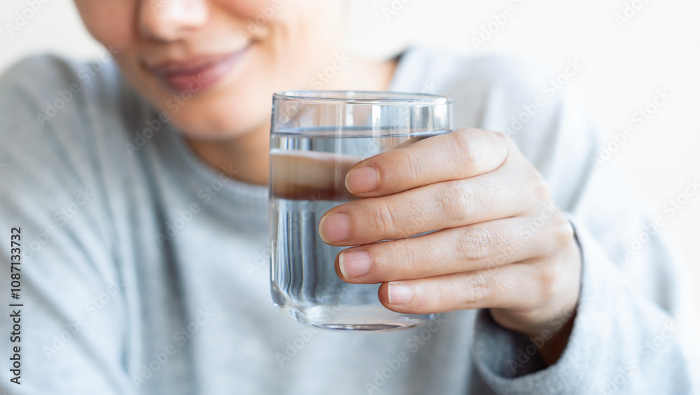 Water concept, Woman Drinking Water on white background Water concept, Woman Drinking Water on white background