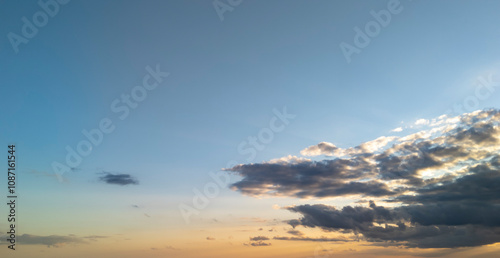 A stunning view of the sky at sunset showcasing vibrant colors and soft clouds, perfect for nature lovers and photographers.