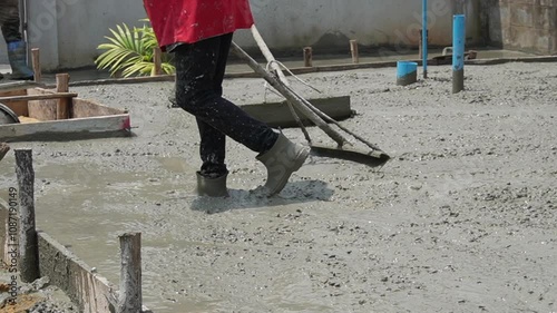 pan shot making floor from cement plant with human man power