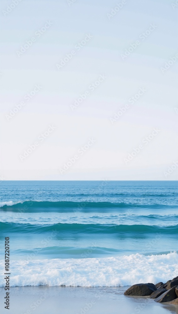 Minimalist background features a tranquil ocean horizon during the Geelong Cup race highlighting waves crashing at Torquay Victoria Minimalist background features a tranquil ocean horizon during the Geelong Cup race highlighting waves crashing at Torquay Victoria
