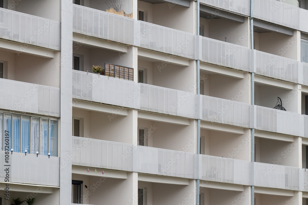 Multi-family apartment block with lots of windows