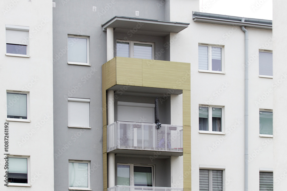 Multi-family apartment block with lots of windows