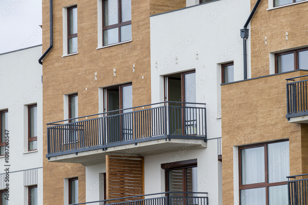 Multi-family apartment block with lots of windows