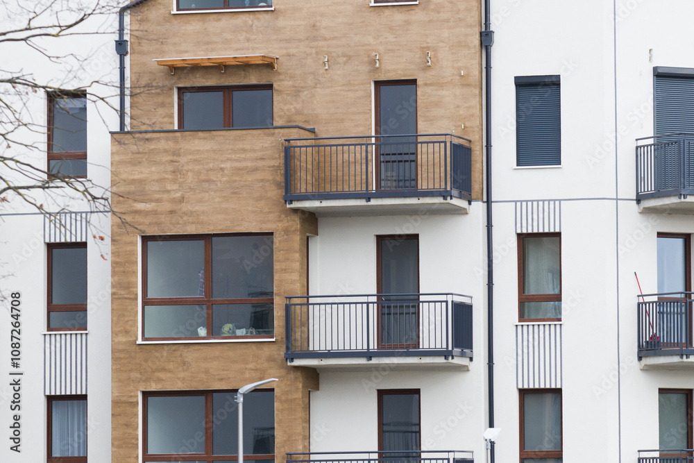 Multi-family apartment block with lots of windows