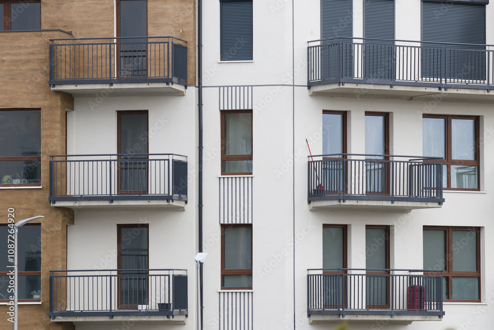 Multi-family apartment block with lots of windows