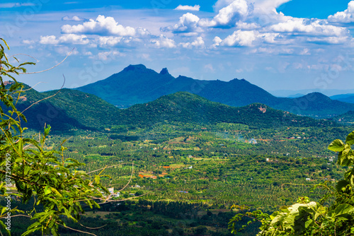 Beautiful landscape with mountains and blue sky. Yercaud hill station, Tamil Nadu, India photo