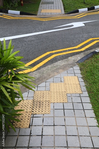 Tenji blocks on sidewalk in Singapore City photo