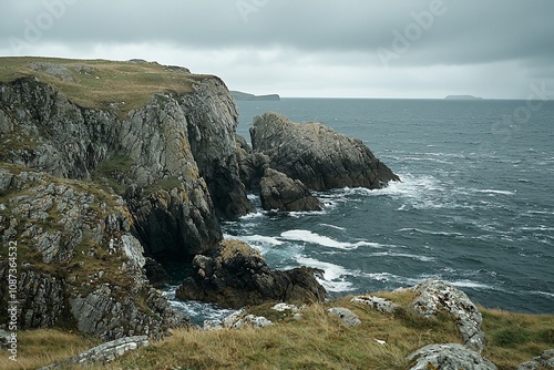 Dramatic Coastal Landscape: Rugged Cliffs and Turbulent Waters photo