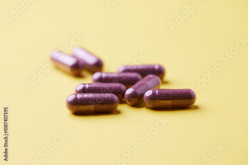 Lutein capsules. Dietary supplement on bright background. Soft focus. Close up. Copy space photo