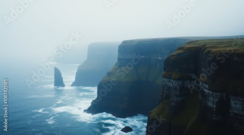 Misty coastal cliffs by the ocean photo