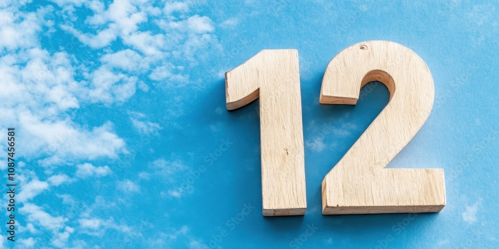 Wooden Number Twelve on Blue Background with Clouds Wooden Number Twelve on Blue Background with Clouds