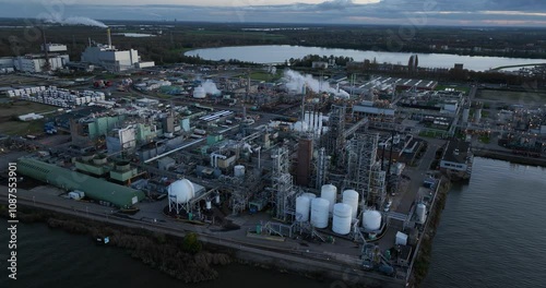 Aerial drone view on controversial chemical factory in Dordrecht, where PFAS such as TFA, PFPrA, TFPrA and DFA are produced and released. Causing cancer hazard and health risks. Aerial view. photo