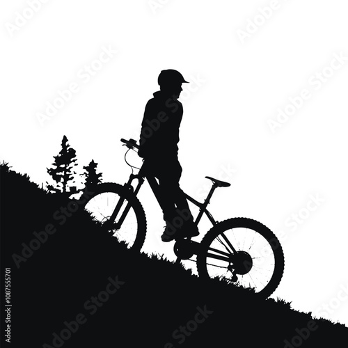 a silhouette of a person riding a bicycle on a hill .