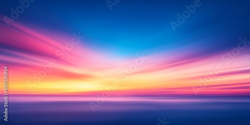 Defocused sunset featuring a stunning blue sky, capturing the serene essence of a vivid sunset amidst a captivating blue sky atmosphere. Experience the beauty of the sunset in this image.