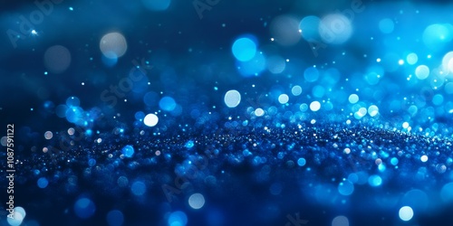 Close up of blurred bokeh effects on a blue background, showcasing beautiful bokeh patterns and vibrant hues of blue that create a dreamy atmosphere with captivating bokeh elements.