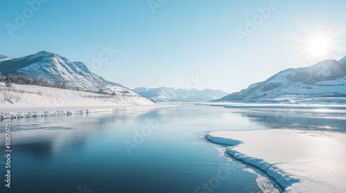 Serene Winter River Landscape SnowCapped Mountains, Frozen Banks, Blue Sky