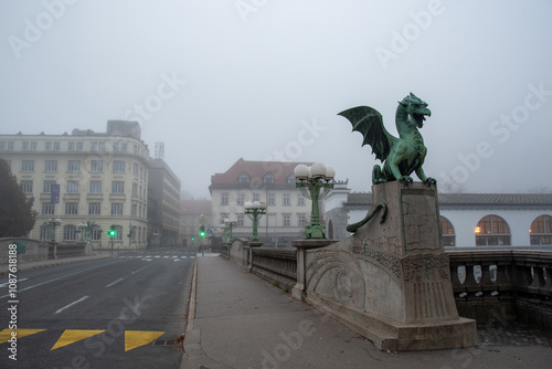 Dragon bridge in ljubljana Slovenia on a foggy day photo