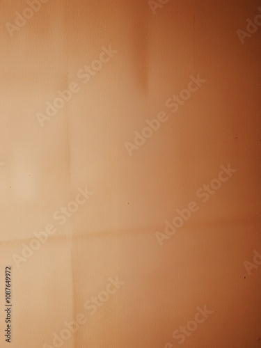 Plain brown wall texture with subtle nuances in light and shadow