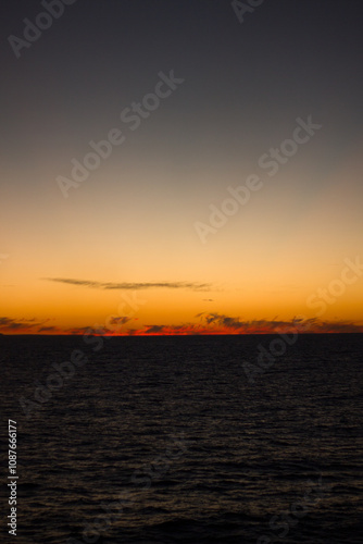 Dark sunset on the sea with mountains 3 photo