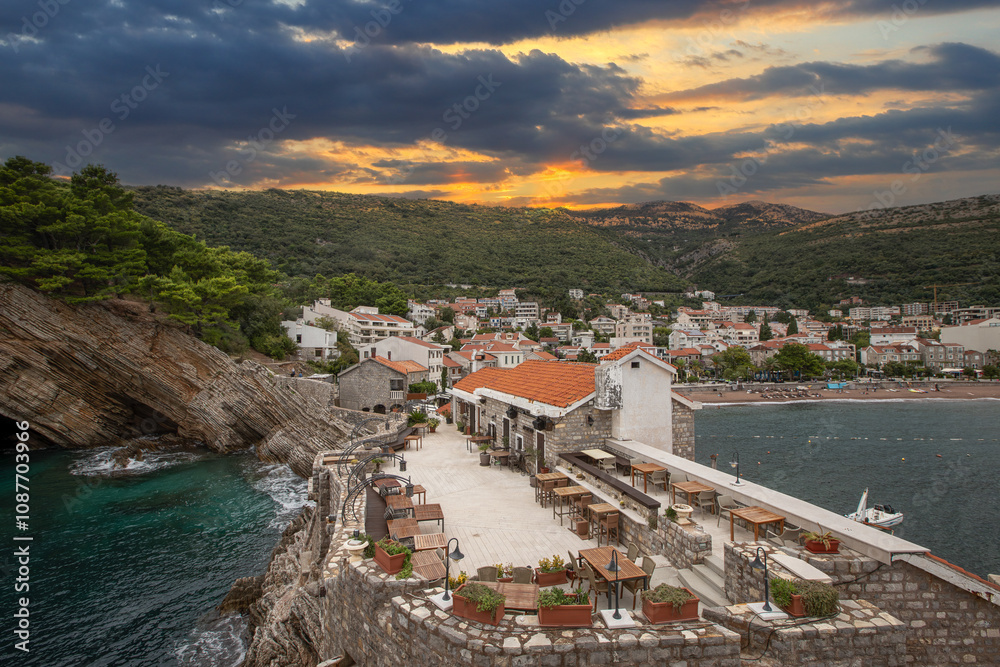 Town of Petrovac beach and coastline aerial view