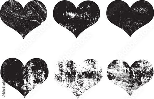 Set of textured vector valentine hearts. Decorative design elements. Distressed symbols of love. Textured Valentine's Day signs. Vector illustration. Black hearts isolated on white. EPS10