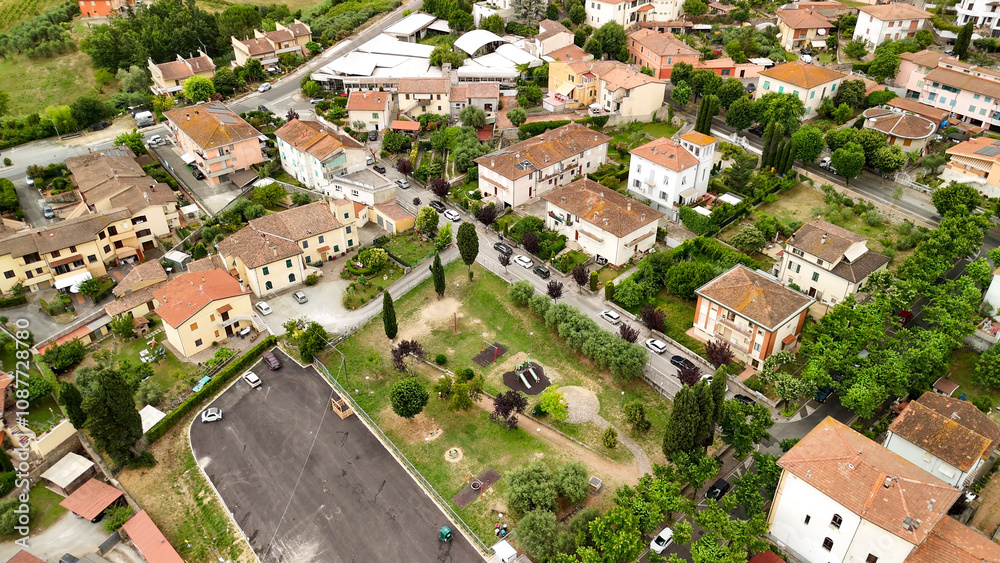 Fototapeta premium Aerial view of the historic center of Casciana Terme, Pisa, olive trees and vineyards in the background