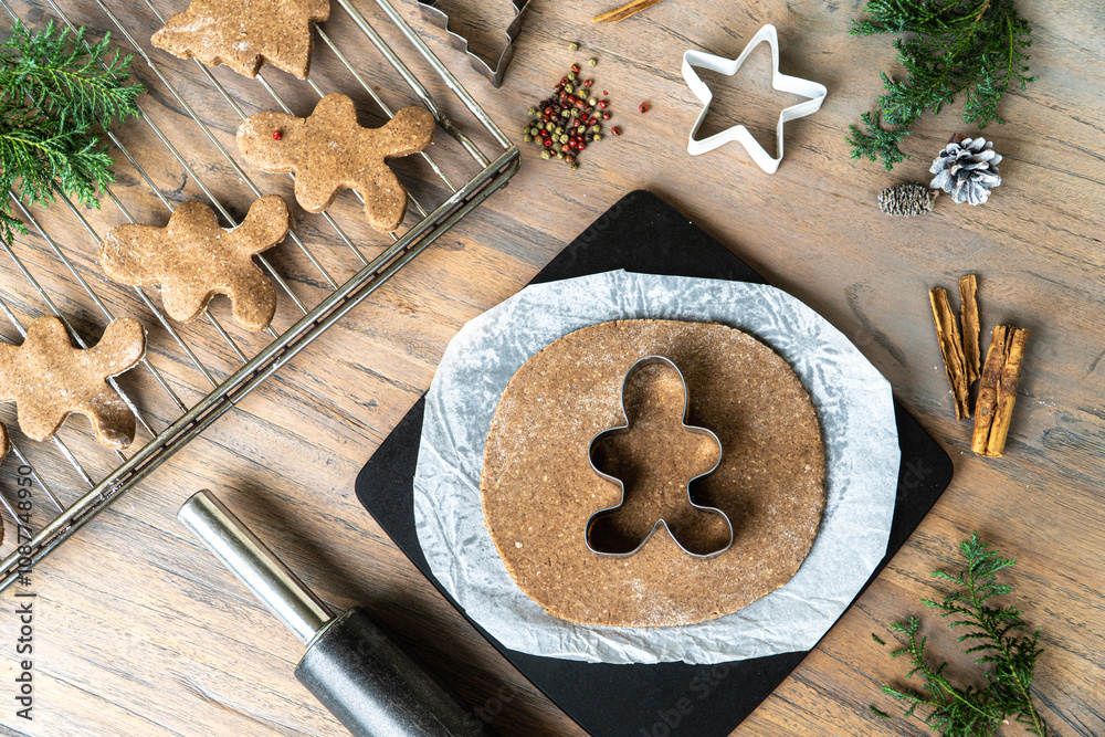 Christmas Background with Gingerbread Men, Trees, and Pine Cones