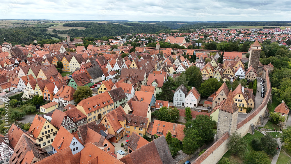Obraz premium Rothenburg ob der Tauber on the romantic route, the old town and watchtowers within the historical castle. Aerial photography by a drone