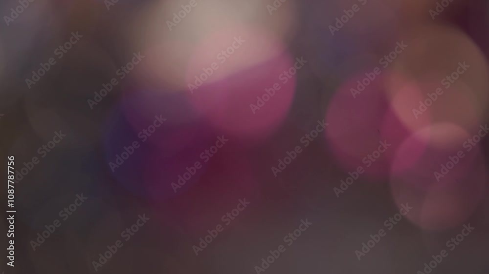 introduction vidéo en plan fixe avec effet, apparition de billes de bokeh multicolores, animation visuelle pour arrière plan mauve