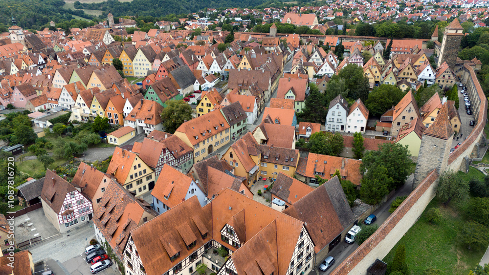 Naklejka premium Rothenburg ob der Tauber on the romantic route, the old town and watchtowers within the historical castle. Aerial photography by a drone