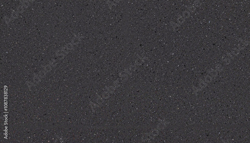 Black textured background with speckled surface.