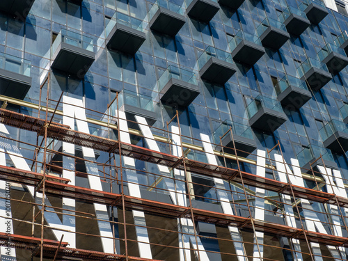 Facade of a modern multi-storey building. Balconies of a high-rise building. Marriott building in Batumi. The building is almost completed.