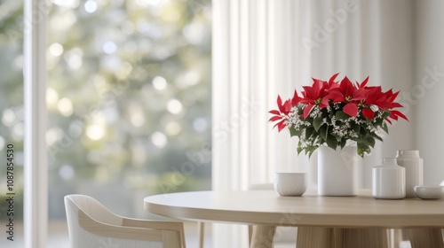 Cozy winter table setting with red poinsettia and white cup near a softly lit...