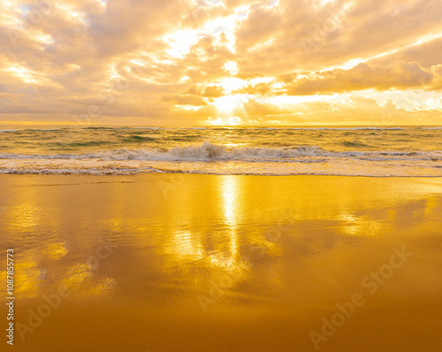 Golden Sunrise on The Sandy Shores of Lydgate Beach, Lydgate Beach Park, Kauai, Hawaii, USA photo