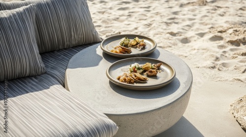 A quiet beachside table set for breakfast with delicious pastries during the ...