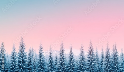 Winter morning landscape with snow covered trees and a pastel sky at dawn