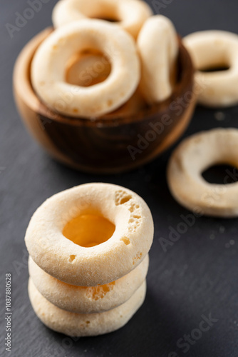 small cheese and yucca bagels, on a rustic background