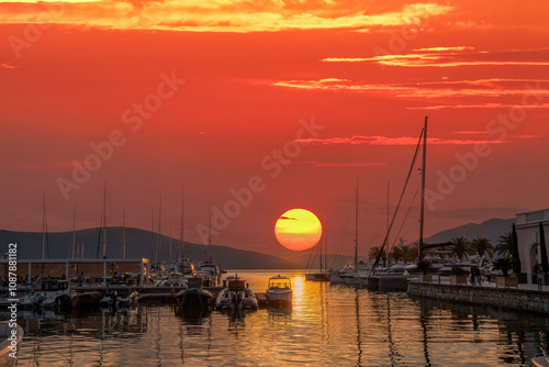 Obraz na płótnie The natural beauty of Tivat town, the view of the yachting port, the sunset on the Montenegrin coastline. An unforgettable summer holiday. w salonie