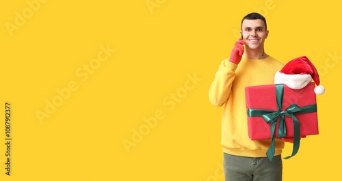 Handsome young man holding ...
