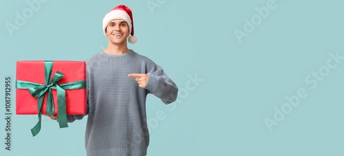 Handsome young man in Santa...