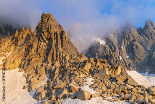 Aiguilles du Chamonix showcases sharp rocky mountain peaks in the French Alps. Ideal for photography, this striking landscape features rugged summits, alpine terrain, and breathtaking natural scenery. photo