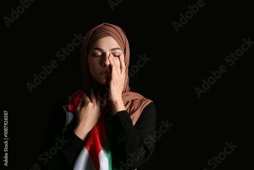 Young Muslim woman with Pal...
