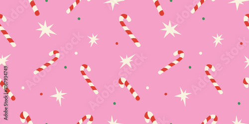 Cute Christmas seamless pattern with candy cane, stars on pink background for holiday designs.