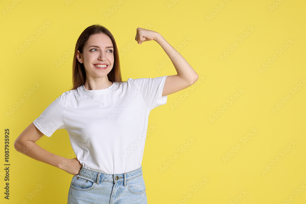 Happy winner on yellow background, space for text Happy winner on yellow background, space for text