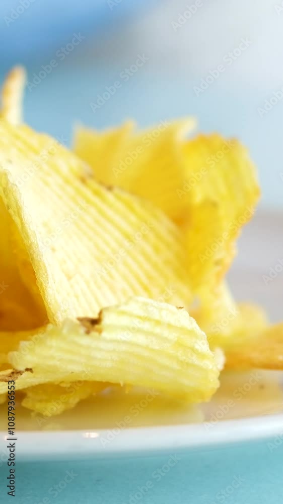potato chips on white background close up potato chips on white background close up
