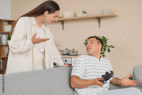 Young woman quarreling with...